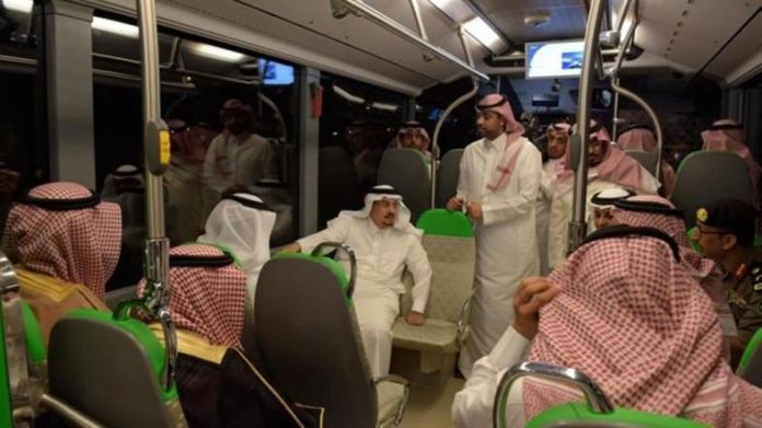 Riyadh Emir Prince Faisal Bin Bandar inspects the new coaches for the bus network project on Monday. (SPA)